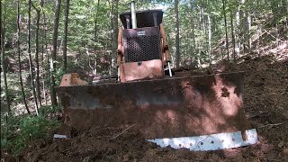 Case Dozer Cutting Out Old Logging Road