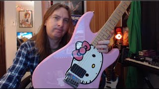 Mr Crowley on a Hello Kitty Guitar