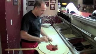 Cheese pizza in Largo, FL. Santo Make Pizza. Calzone in Largo, FL. Sardos Pizza screenshot 1