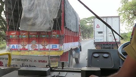 Cabin view :Ksrtc bus chasing heavy trucks on national highway