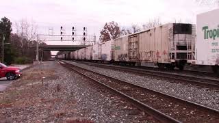 MVI 0554 csx train Q301-22 mix frieght and csx Q276 -21 full auto rack at st Denis  at st