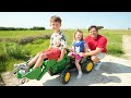 Using kids tractors on the farm to clean hay field | Tractors for kids