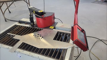 Down draft plasma table: ArcDroid CNC plasma table.