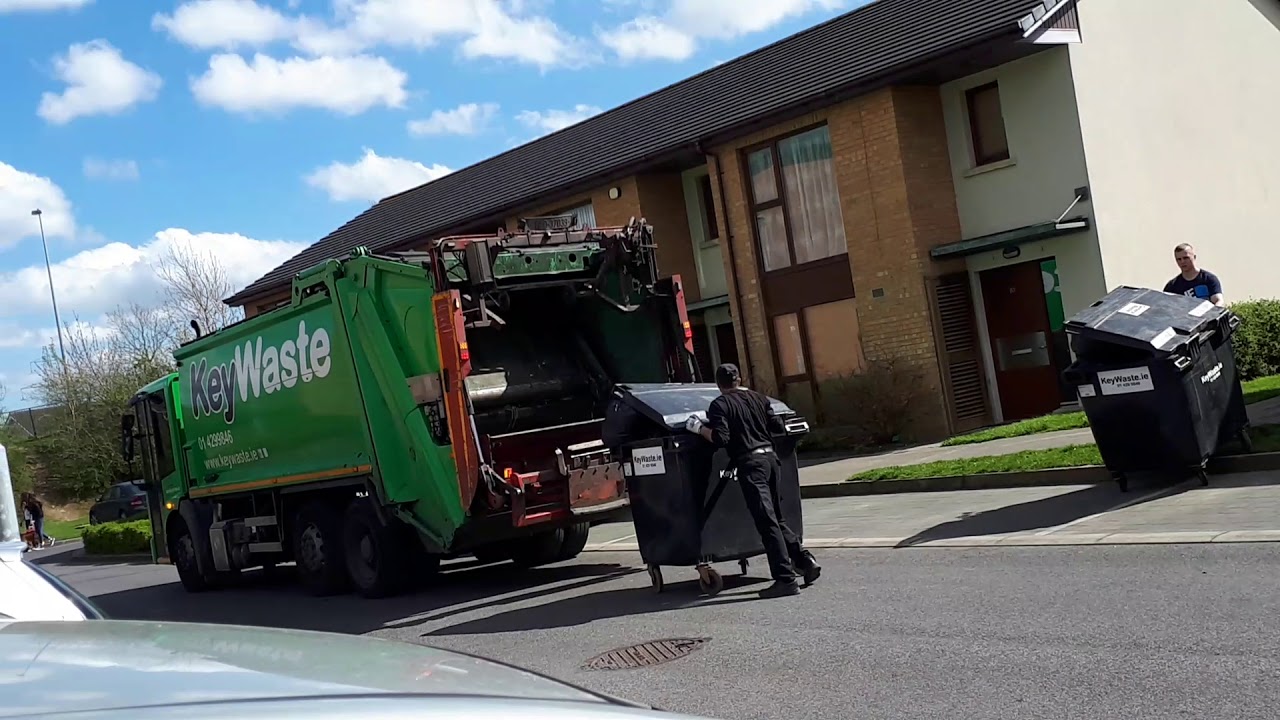 Key waste Mercedes bin lorry collecting black bins (general waste