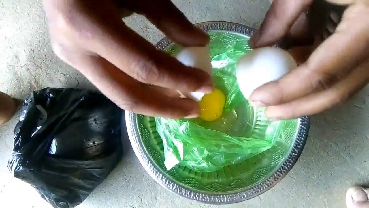Boiling an egg in plastic carrybag |