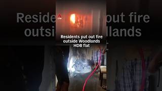 Residents put out fire outside Woodlands HDB flat
