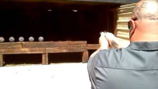 TON JONES of AUCTION HUNTERS fires a PINK revolver at the gun range