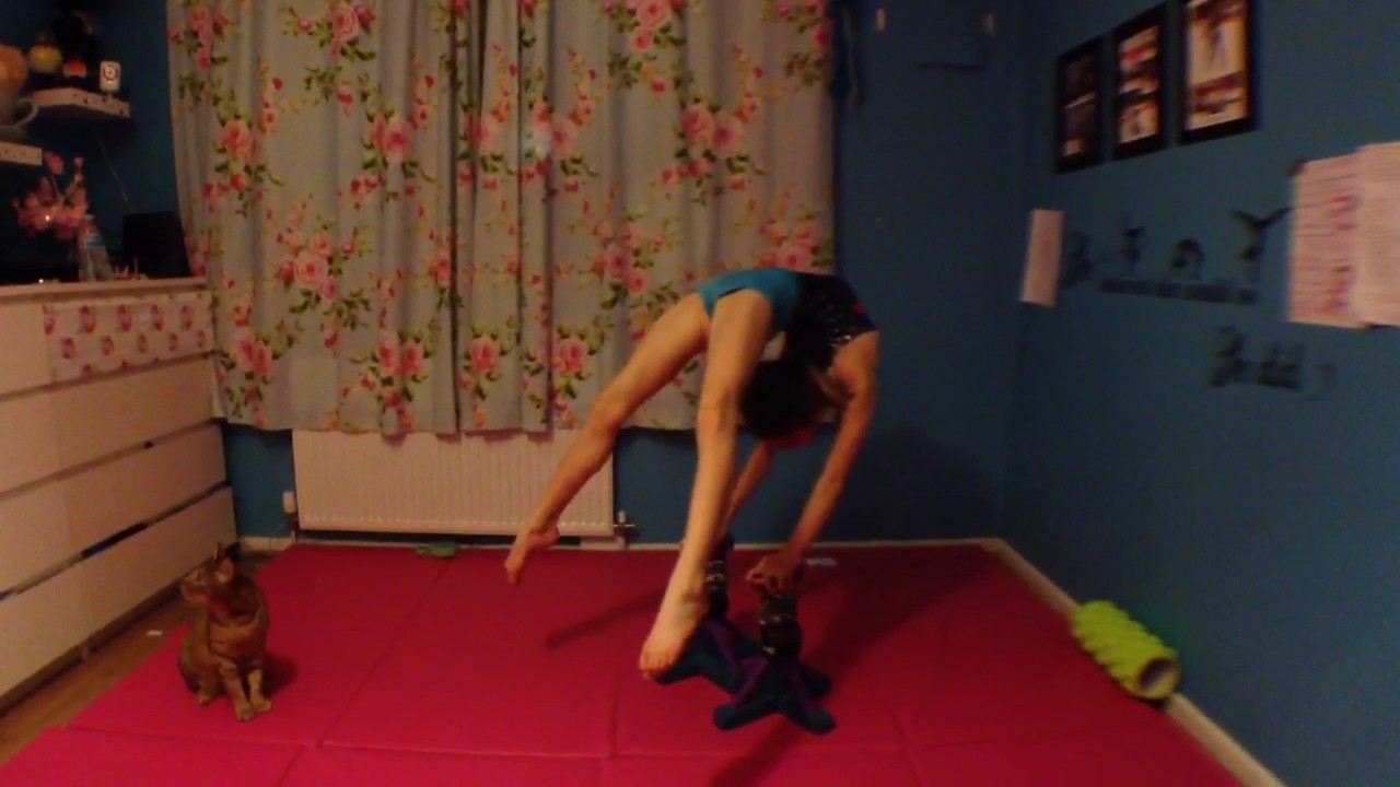 Amber doing pike into overarch on blocks