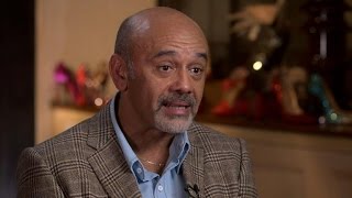 Louboutin on using spikes in shoe designs, breaking away from standards