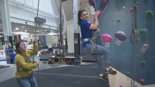 Mary Ours tries rock climbing