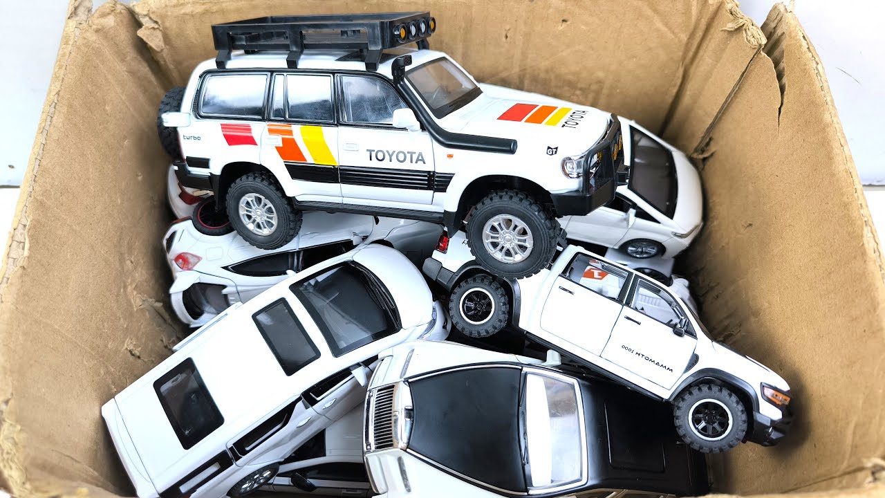 Box Full of Model Cars -Mazda Mx5, Koenigesgg Jesko, Lamborghini Scv12, Byd Yang Wang U8, Toyota Car