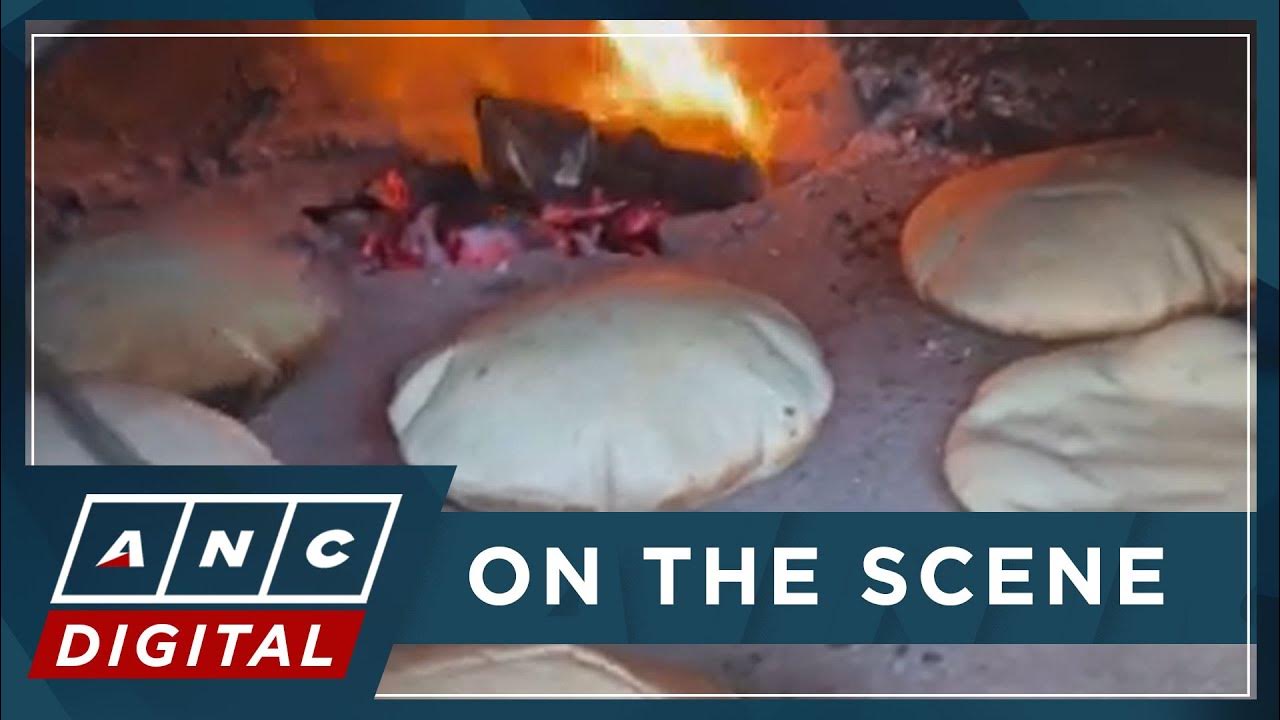 Without fuel and electricity, Gazans turn to clay ovens to bake bread