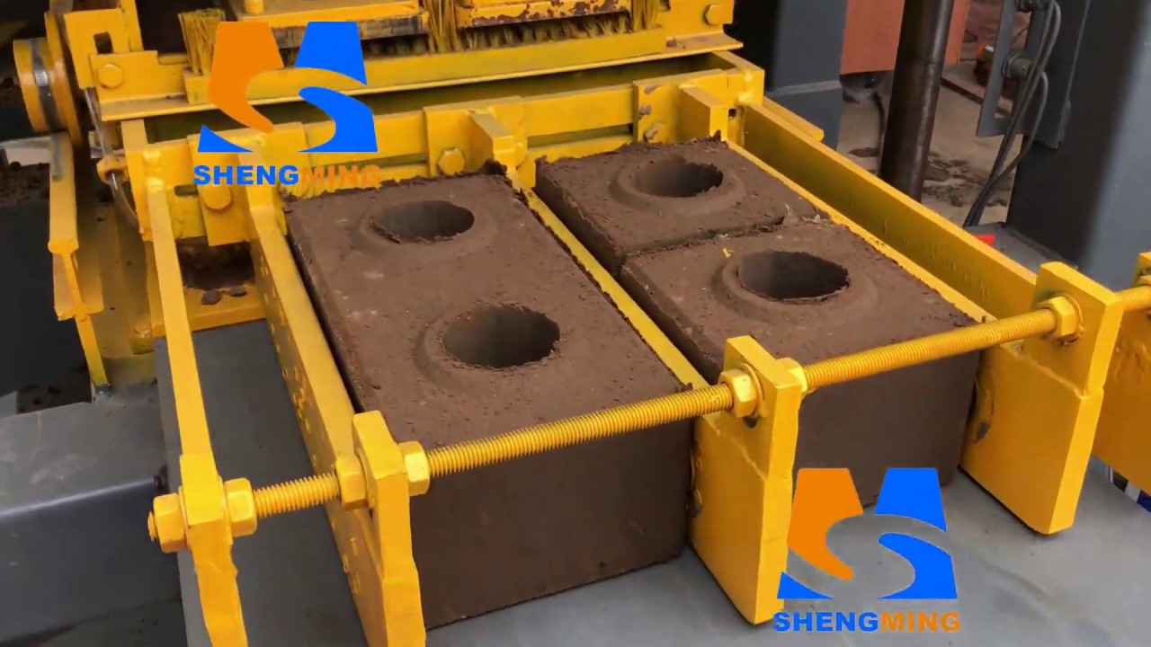 SHM2-10 interlocking clay brick machine - YouTube