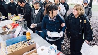 Police Arrest 7 People For Serving Food To The Homeless In Public Park