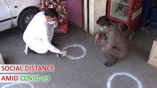 See How Circles Draw Outside Shops To Maintain Social Distancing amid COVID-19 Scare In Pakistan ??