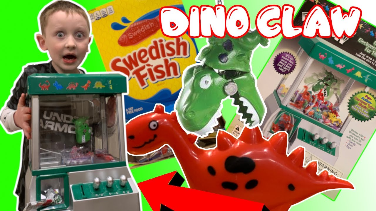 WE FILLED A CLAW MACHINE WITH SWEDISH FISH! Dino Claw Game with Lights ...