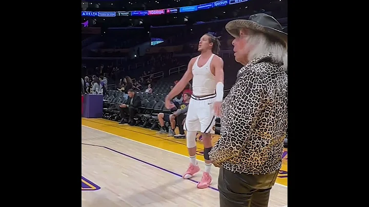 Jimmy Goldstein watches Jamal Murray and Aaron Gordon warm up prior to Nuggets-Lakers