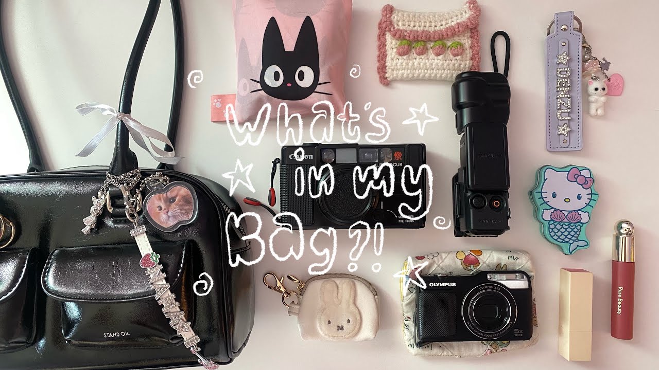 what’s in my bag as someone who likes carrying all her cameras 🪩 (& my essentials lol)