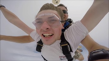 Skydiving through a rain cloud - Cairns (5000m high)