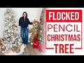 Flocked pencil christmas tree decorated