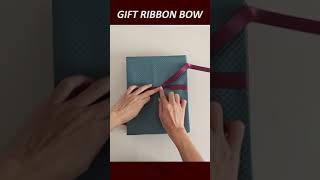 How to tie a ribbon bow on gift box