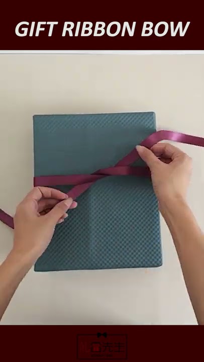 How to tie a ribbon bow on gift box