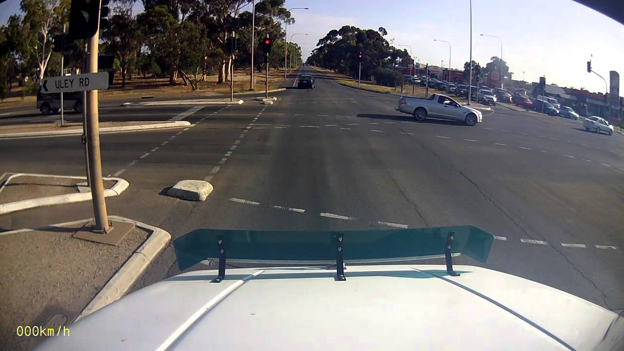 Blatant red light runner and turn from wrong lane - YouTube