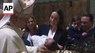 Pope Leo baptizes babies in tradition marking end of Christmas season