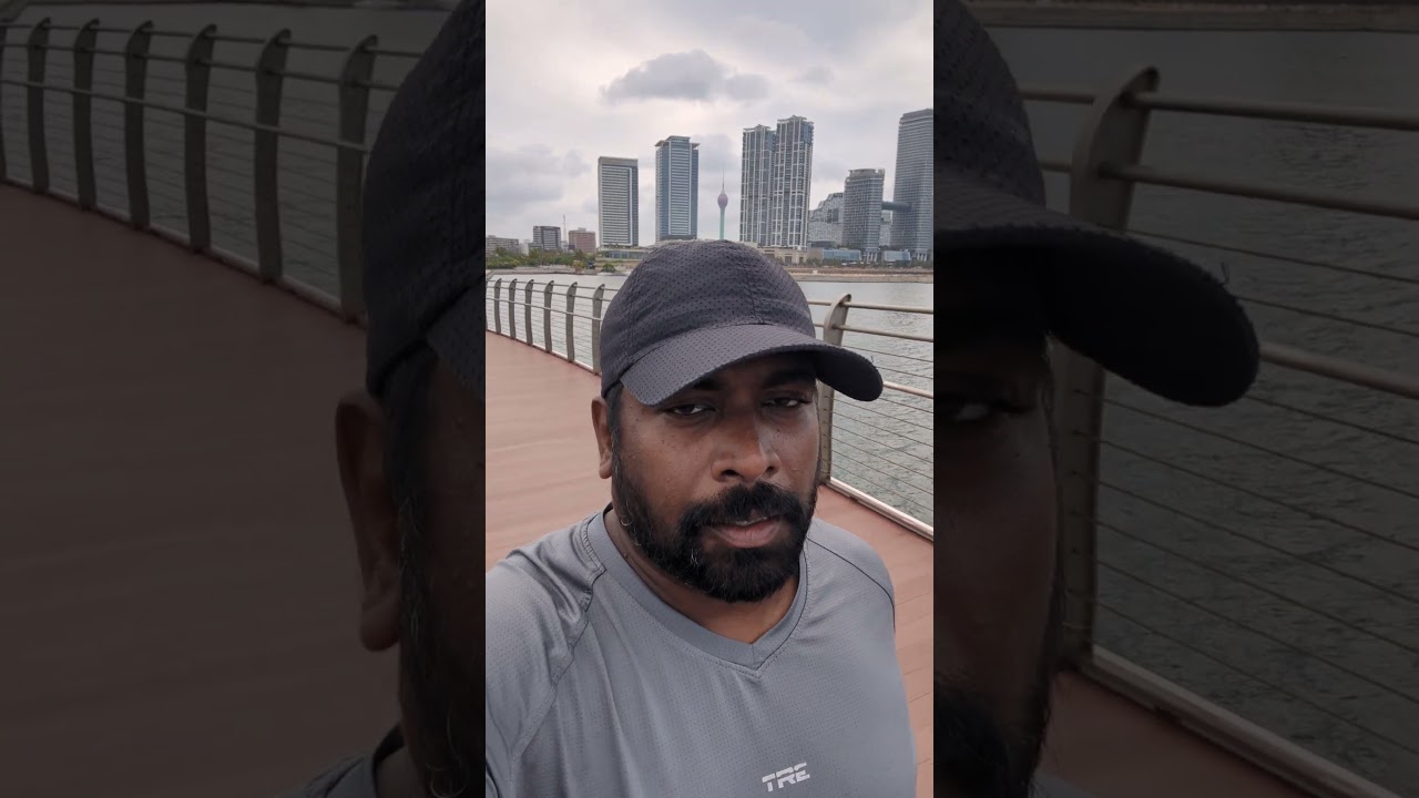 Walking on the bridge on a day with overcast weather conditions.