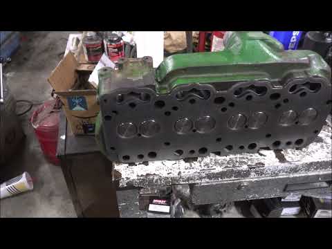 Deere Dubuque 4 cylinder head rebuild