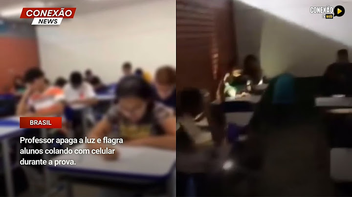 Professor apaga a luz e flagra alunos colando com celular durante a prova.