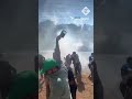 Israel-Jordan border: Jordanian police fire tear gas on crowd approaching border fence
