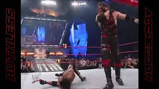 Kane Chokeslams to Booker T