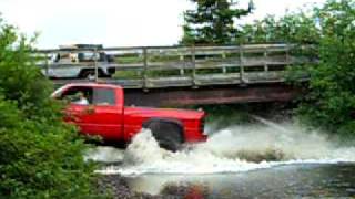 Lifted Dodge V10 and Jeep in River #2