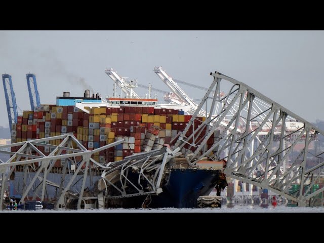 NTSB officials make their way onto cargo ship which brought down Baltimore bridge