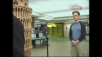 shot on Iphone 6 meme | Clumsy Reporter Knocks Down Jenga Tower