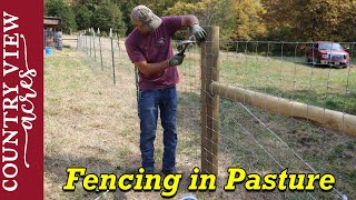 Fencing in our first section of pasture