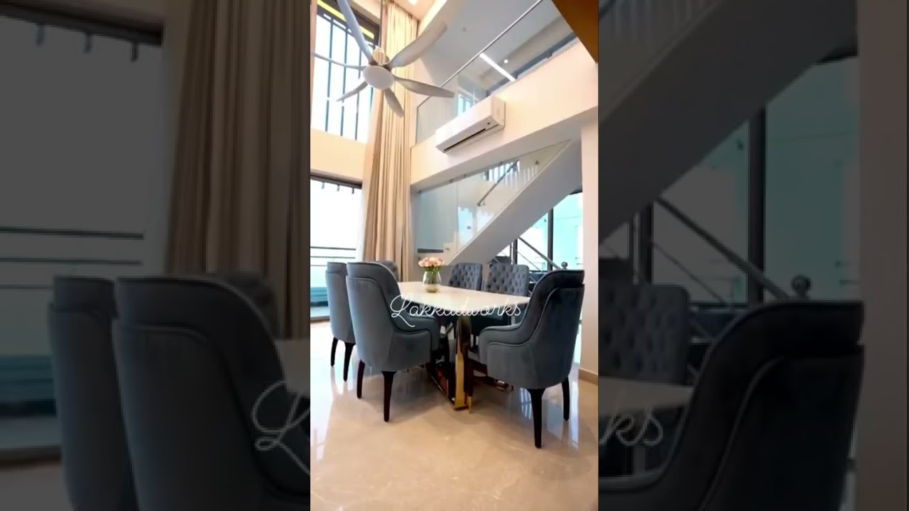 CustomDining table designed in ss metal base and double back chair for a penthouse in Tata Primanti