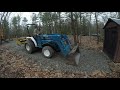 Spreading out gravel and moving brush