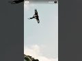 The golden eagle swooped down from the sky, precisely capturing the goat