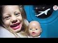   flying with baby doll twins