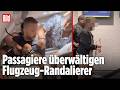 Panik im Flugzeug: Passagiere stoppen Cockpit-Stürmer!
