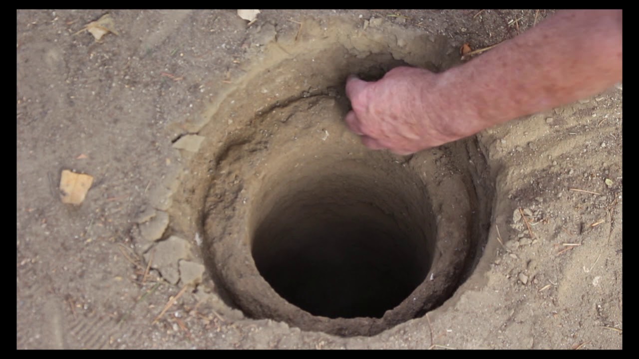 Post Hole Digger - Reaming 6-inch hole to 12-inches with Shop Vacuum