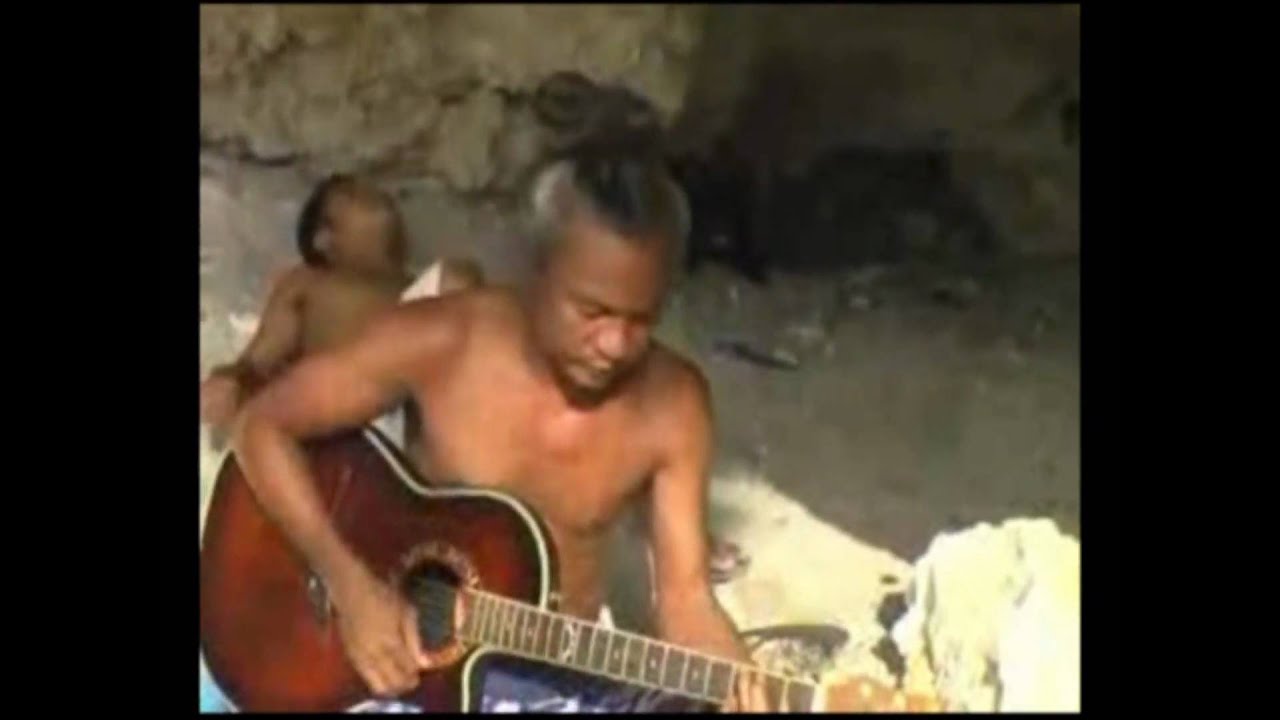 TOTO DELGADO's  puting dalampasigan ( acoustic version )