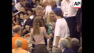 USA - Clinton gives support to Olympic swimmer