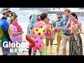 Prince Harry and Meghan attend 'Fluro Friday' session on Australia's Bondi Beach