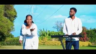 Asati Woygiyonatamenech Belete Mezmur