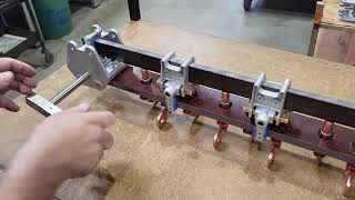 FII tap changer with control device 27432-B-UNI : Reversal of the 2-part bracket.