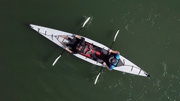 "First origami tandem kayak" folds down to suitcase size
