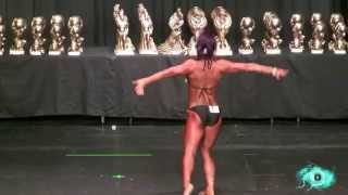 WNBF Woman's pro body building skit mixing belly dancing and posing.